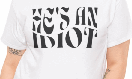 He’s An Idiot T-Shirt – Black Wave Text Design.