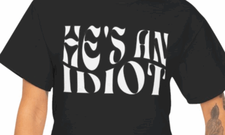 He’s An Idiot T-Shirt – White Wave Text Design.
