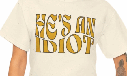 He’s An Idiot T-Shirt – Gold Wave Text Design